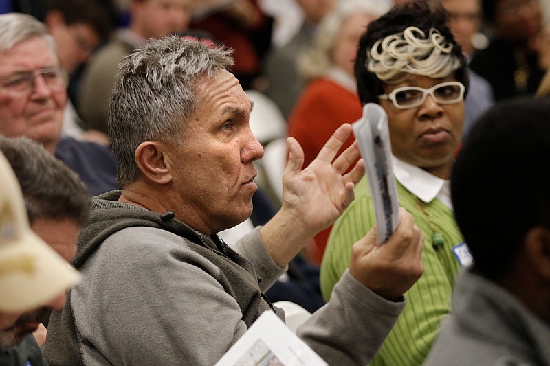 Ed Nowicki asks a question during a public meeting held by the Environmental Protection Agency at South Chattanooga Recreation Center on Tuesday, Feb. 13, 2018, in Chattanooga, Tenn. The EPA held the meeting to address community concerns about lead pollution in the Southside Chattanooga Lead Site, which includes the Alton Park and Jefferson Heights neighborhoods.