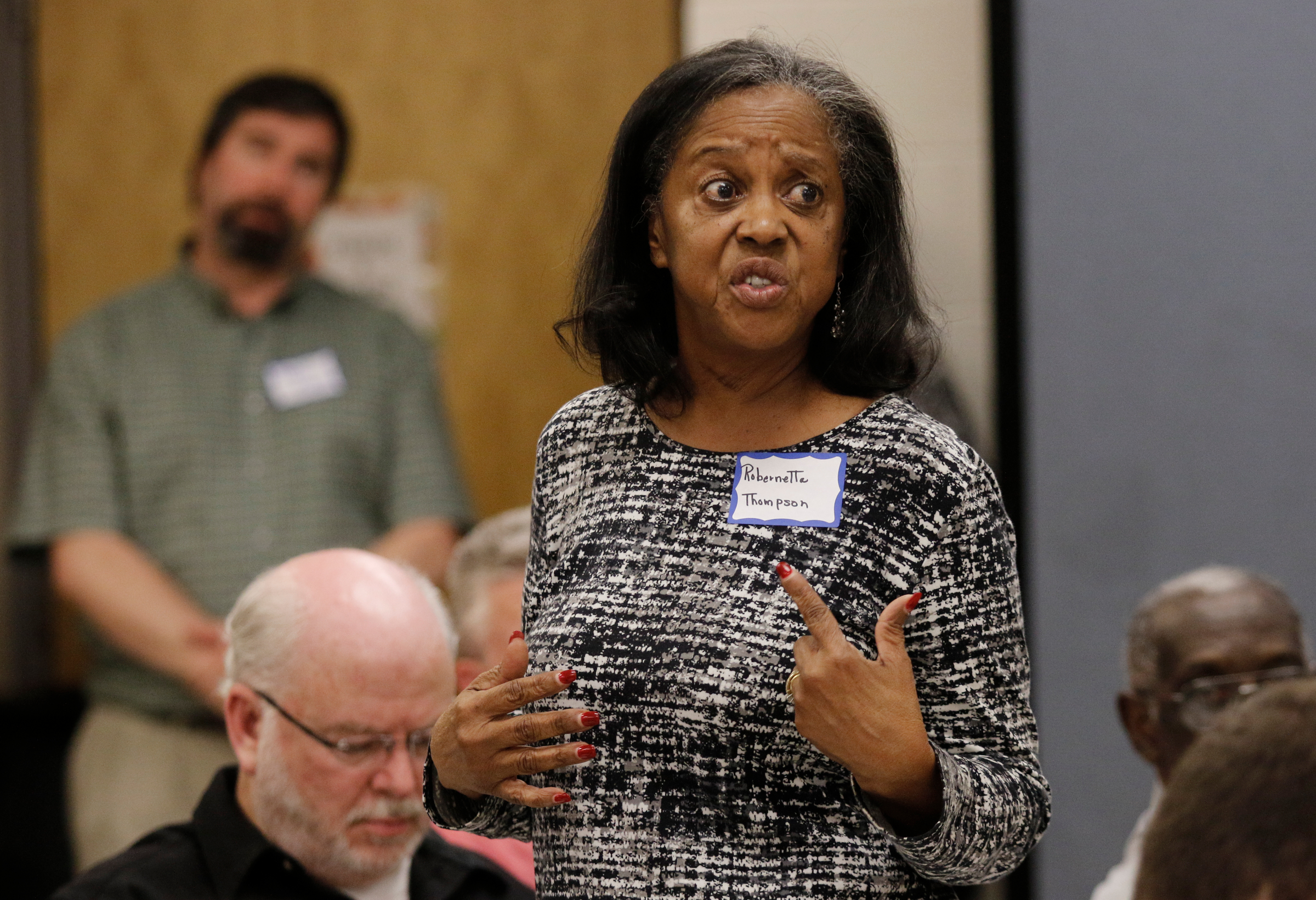 Robernette Thompson asks a question at a public meeting held by the Environmental Protection Agency at South Chattanooga Recreation Center on Tuesday, Feb. 13, 2018, in Chattanooga, Tenn. The EPA held the meeting to address community concerns about lead pollution in the Southside Chattanooga Lead Site, which includes the Alton Park and Jefferson Heights neighborhoods.