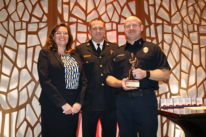 (left to right) City of Chattanooga COO Maura Sullivan, Fire Chief Phil Hyman and Firefighter of the Year FFS Jack Thompson