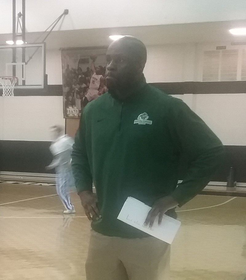 Notre Dame boys' basketball coach Jonathan Adams is shown.