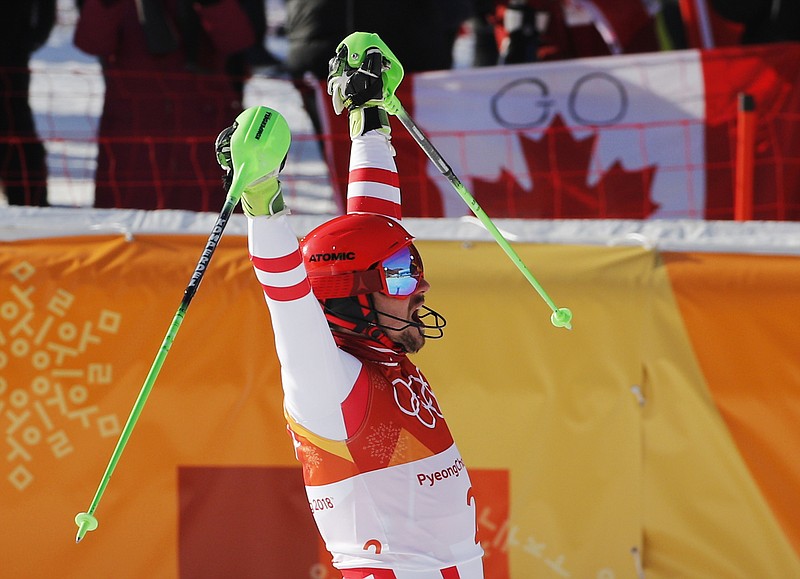 Austria's Marcel Hirscher celebrates after completing the slalom portion of the men's combined at the 2018 Winter Olympics in Jeongseon, South Korea, Tuesday, Feb. 13, 2018. (AP Photo/Christophe Ena)