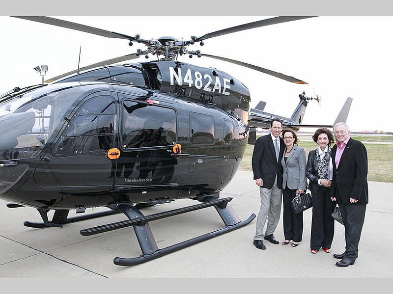 Dallas Cowboys owner Jerry Jones with a specialized Mercedes Benz helicopter.