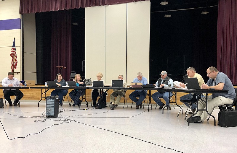 Grundy County, Tenn., school board members discuss agenda items at their Jan. 23, 2018, school board meeting in the Grundy County High School cafeteria in Coalmont, Tenn.