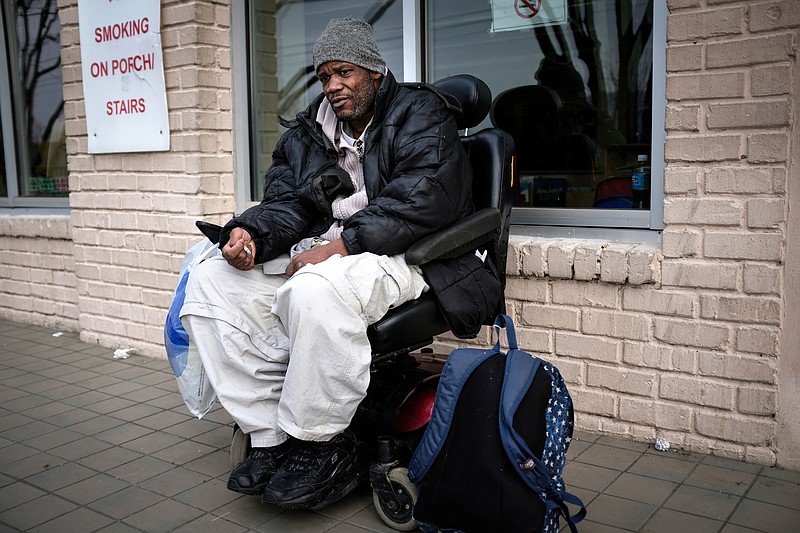 Christopher Leo Hardaway talks about his arrest for assaulting a police officer from the Chattanooga Community Kitchen on Tuesday, Jan. 16, 2018, in Chattanooga, Tenn. Hardaway is paraplegic and uses a wheelchair to get around, and he has limited use of his arms and hands.