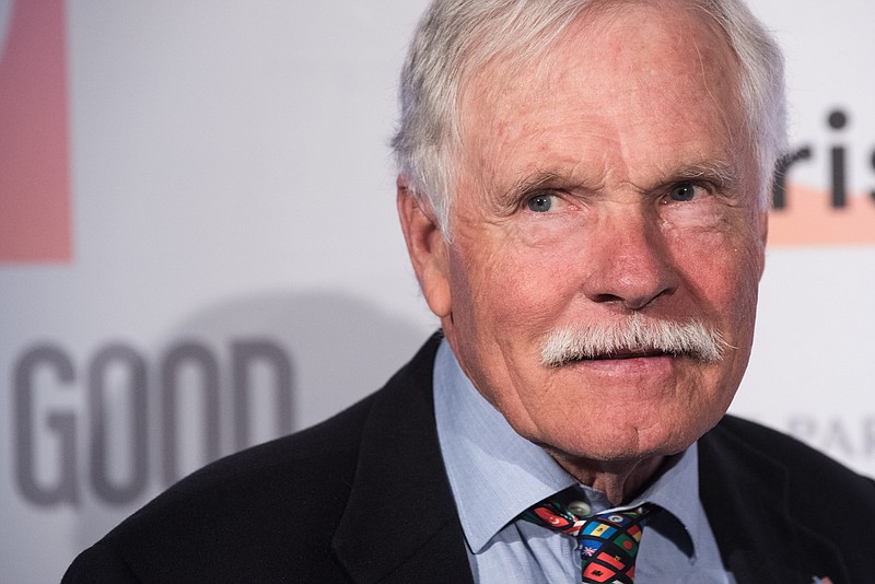 U.S. media mogul Ted Turner poses for the photographers as he arrives prior to a dinner at the US Ambassador's residence in Paris, on the sidelines of the COP21 climate change conference in Paris, France, Tuesday, Dec. 8, 2015. (AP Photo/Kamil Zihnioglu)