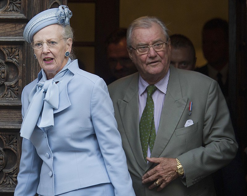 In this Oct. 21, 2014, file photo, Danish royals Queen Margrethe II, left, and Prince Henrik leave after visiting St. Mark church in Zagreb, Croatia. Prince Henrik, the French-born husband of Danish monarch Queen Margrethe who publicly vented his frustration at not being the social equal of his wife or their son in line to become Denmark's king, died late Tuesday, Feb. 13, 2018. He was 83. (AP Photo/Darko Bandic, File)