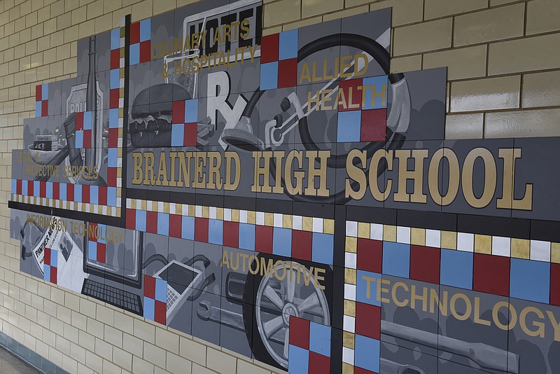 In this Thursday, Mar. 24, 2016, file photo, a mural is seen on the wall near the school entrance at Brainerd High School in Chattanooga, Tenn.