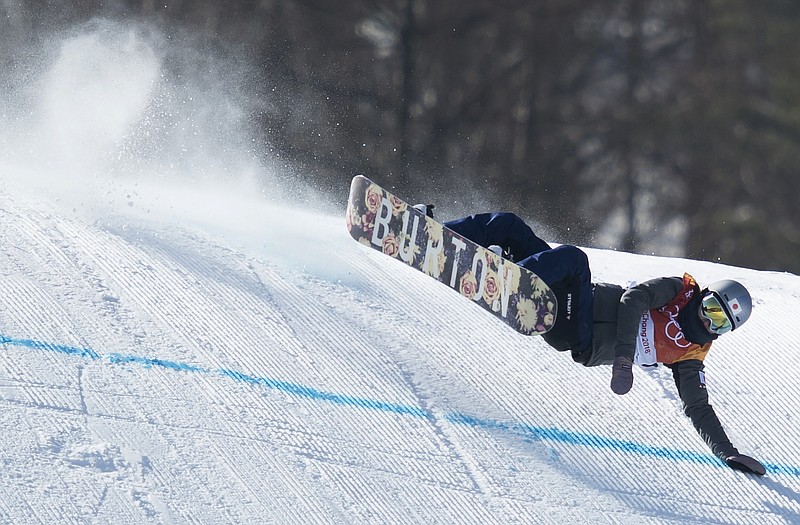 Miyabi Onitsuka of Japan crashes during the women's slopestyle final at Phoenix Snow Park during the 2018 Winter Olympics in Pyeongchang, South Korea. The qualifying event was canceled because of high winds, and athletes either crashed or gave up in 41 out of 50 runs in the final. (Jonathan Hayward/The Canadian Press via AP)