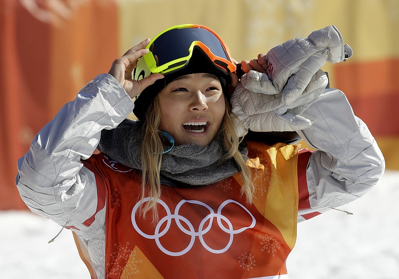 
              FILE - In this Tuesday, Feb. 13, 2018 file photo, Chloe Kim, of the United States, smiles during the women's halfpipe finals at Phoenix Snow Park at the 2018 Winter Olympics in Pyeongchang, South Korea. A San Francisco Bay Area radio station has fired one of its hosts, Patrick Connor, after he made sexual comments about 17-year-old Olympic snowboarder Kim on another station. Program director Jeremiah Crowe of KNBR-AM, where Connor hosted "The Shower Hour," confirmed the firing Wednesday, Feb. 14, 2018, for NBC Bay Area. (AP Photo/Lee Jin-man, File)
            