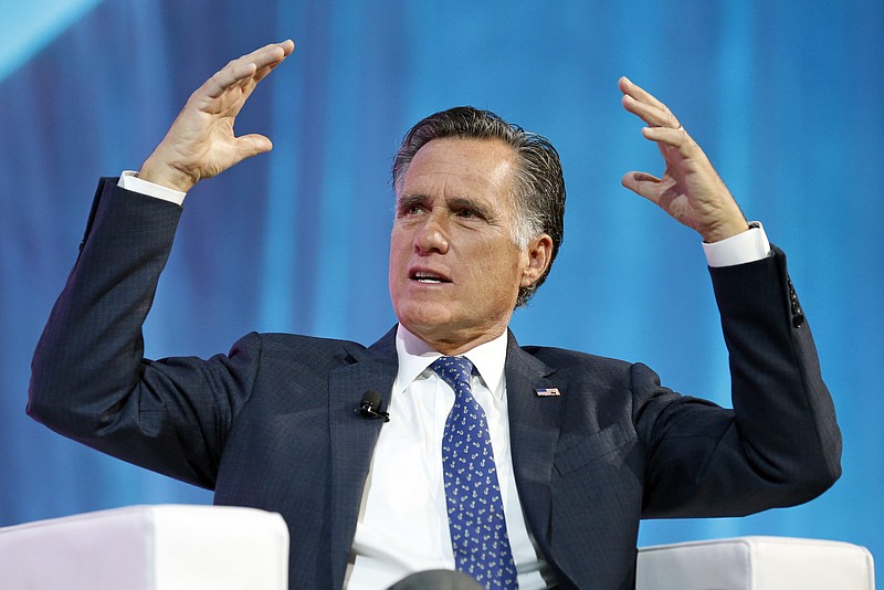 In this Jan. 19, 2018, file photo, former Republican presidential candidate Mitt Romney speaks about the tech sector during an industry conference, in Salt Lake City. Romney plans to announce his Utah Senate campaign Thursday, Feb. 15, 2018. Three people with direct knowledge of the plan say Romney will formally launch his campaign in a video. (AP Photo/Rick Bowmer, File)