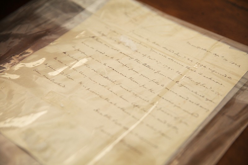 A letter from Thomas Jefferson written to James Madison in 1794 is waiting to be framed at George Nelson's home Wednesday, Feb. 7, 2018 in Chattanooga, Tenn. Nelson has documents signed by George Washington and John Hancock as well as more recent presidents including George H.W. Bush and Jimmy Carter. 