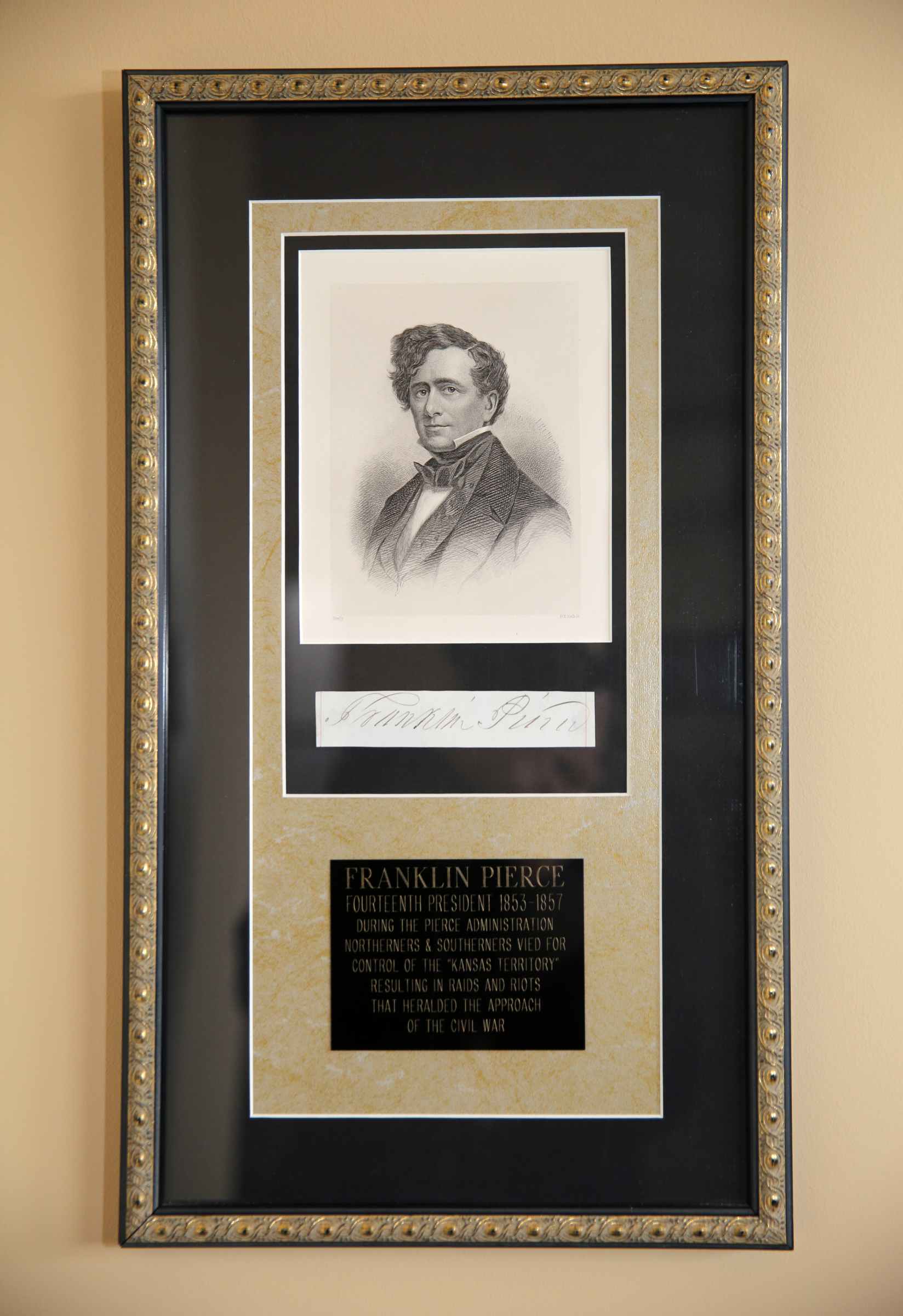 A Franklin Pierce signature is framed below a drawing of the former president at George Nelson's home Wednesday, Feb. 7, 2018 in Chattanooga, Tenn.