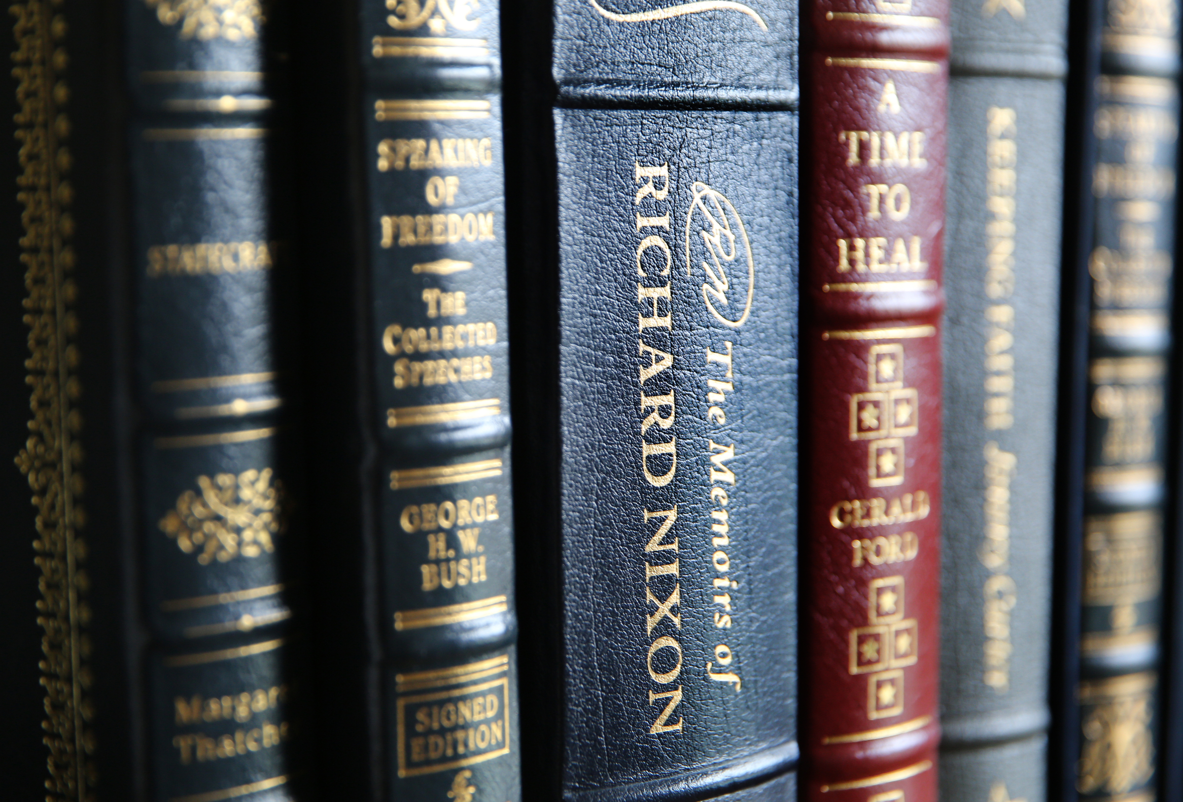Several signed copies of books sit on the shelves at George Nelson's home Wednesday, Feb. 7, 2018 in Chattanooga, Tenn. Nelson is a collector of books and other documents signed by political and other well-known figures.