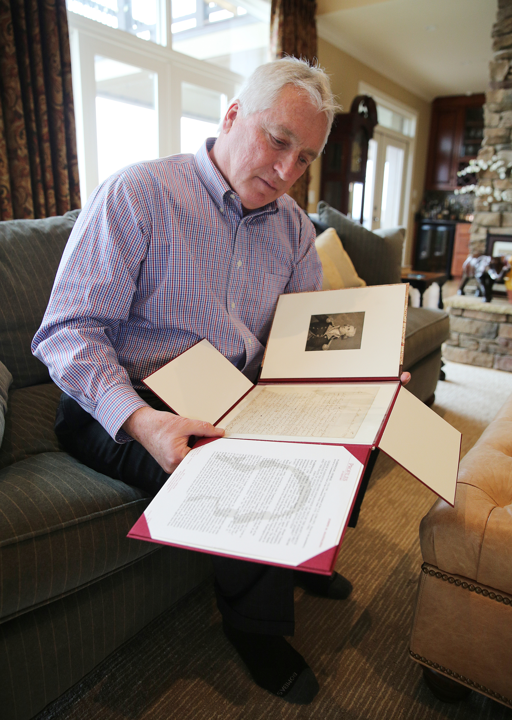 George Nelson talks about a letter he owns which was written by George Washington to an etching artist at Nelson's home Wednesday, Feb. 7, 2018 in Chattanooga, Tenn. The letter consisted of Washington asking the artist how he should pay for a commissioned piece.