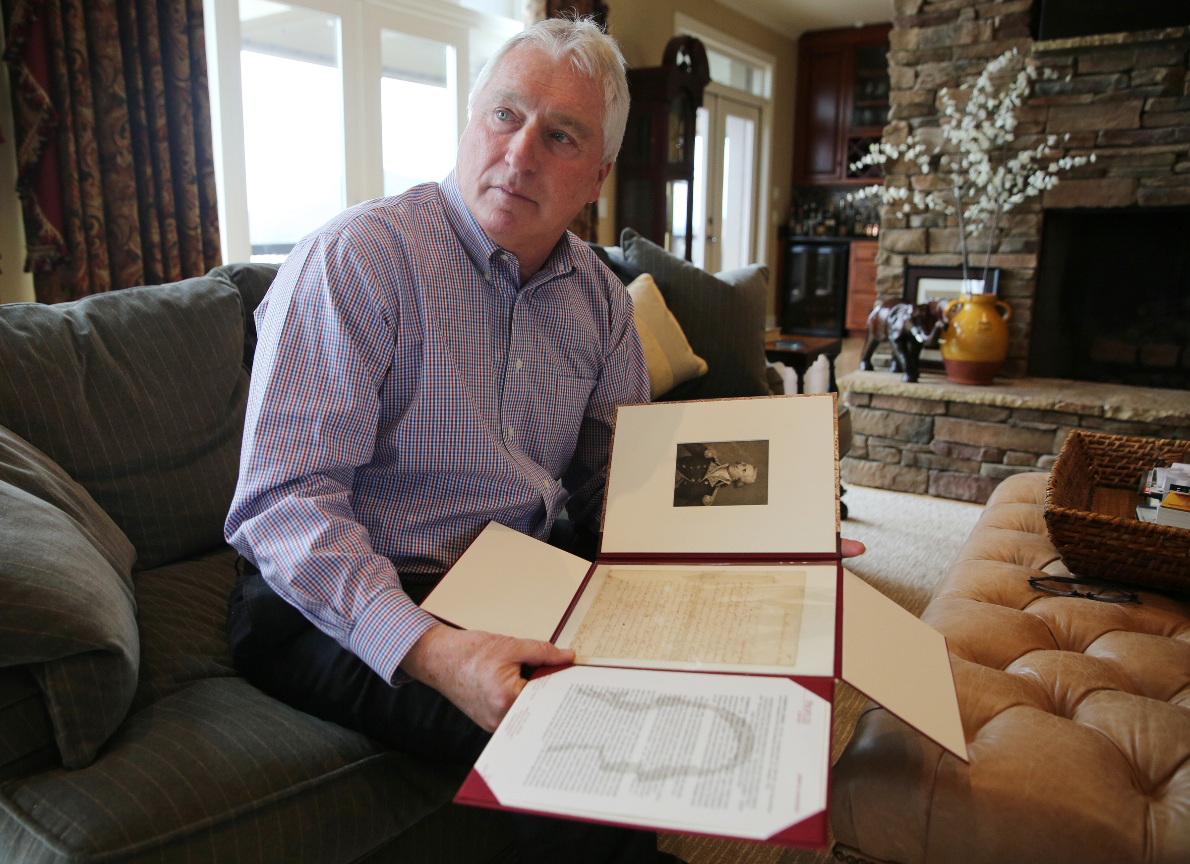 George Nelson talks about a letter he owns which was written by George Washington to an etching artist at Nelson's home Wednesday, Feb. 7, 2018 in Chattanooga, Tenn. The letter consisted of Washington asking the artist how he should pay for a commissioned piece.