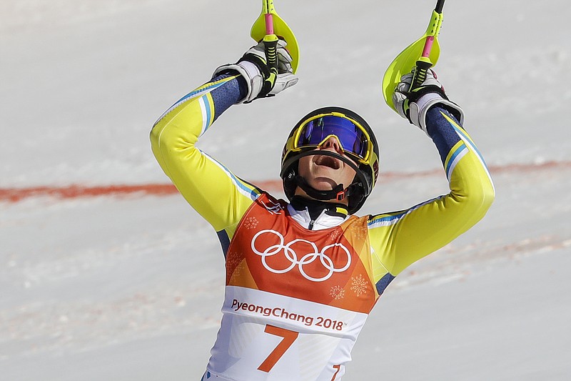 Frida Hansdotter, of Sweden, celebrates after her second run of the women's slalom at the 2018 Winter Olympics in Pyeongchang, South Korea, Friday, Feb. 16, 2018. (AP Photo/Michael Probst)