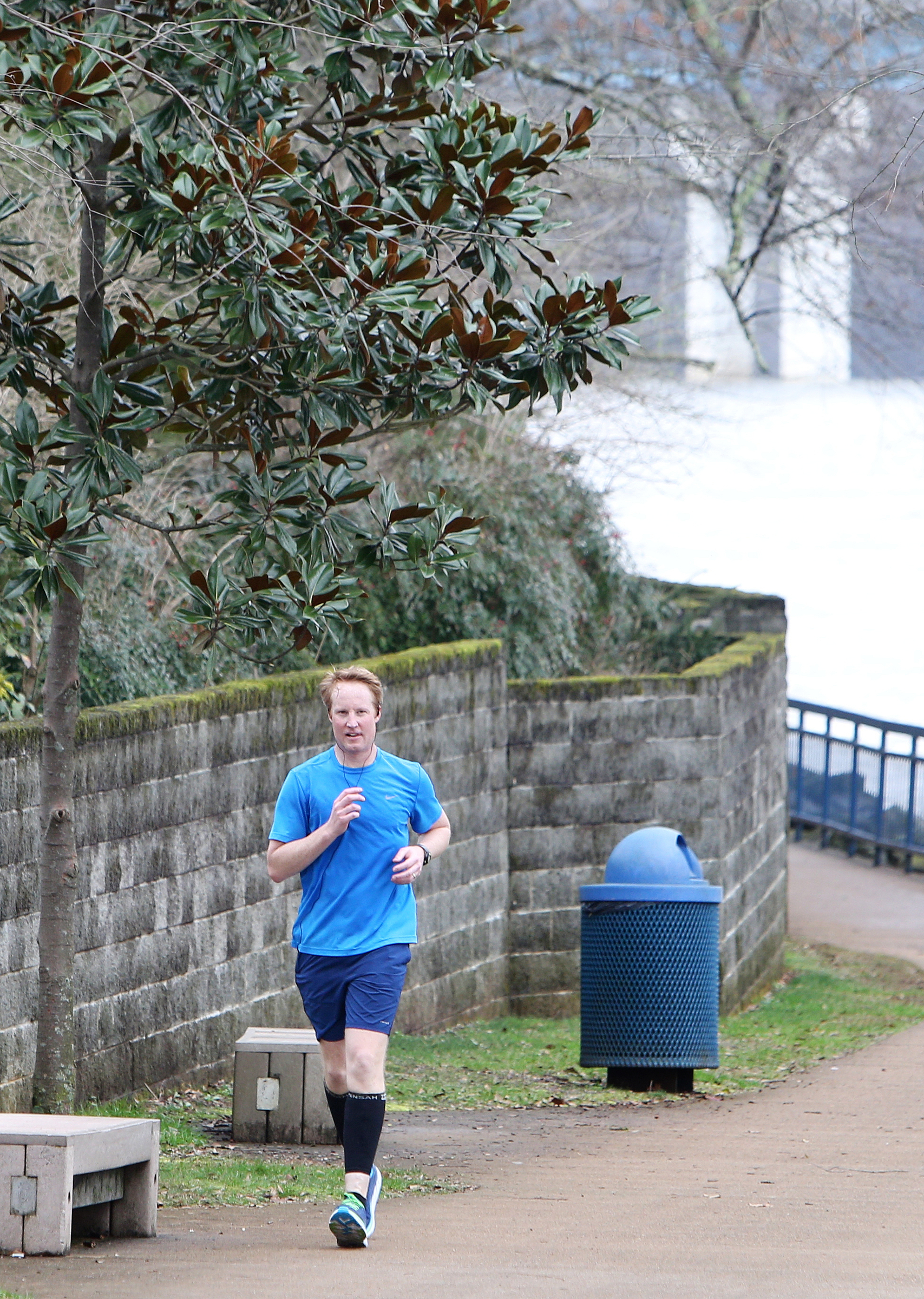 Travis Nowell, runs along the Chattanooga Riverwalk in Chattanooga, Tenn., Monday, Feb. 19, 2018. Nowell has been training through warm and cold weather for an upcoming marathon that he will be competing in, and he said it's a treat for him to be able to train in such warm weather.