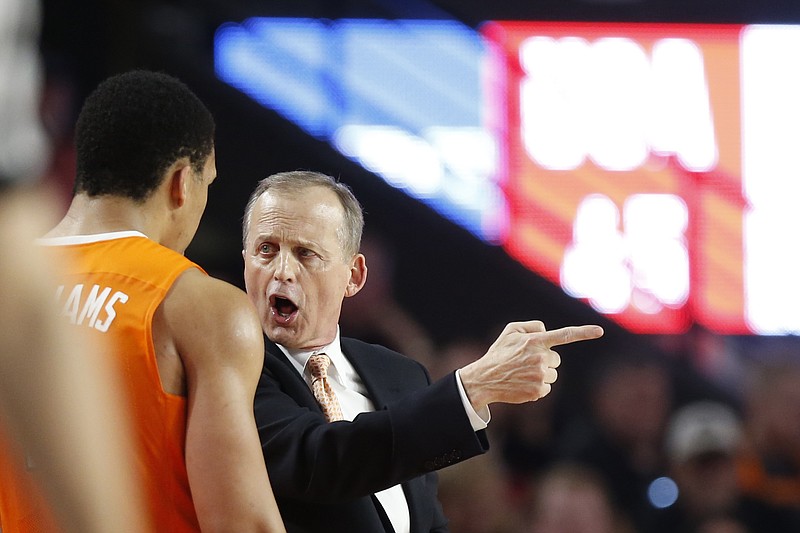 Tennessee coach Rick Barnes specks with forward Grant Williams (2) during the second half of an NCAA college basketball game against Georgia in Athens, Ga., Saturday, Feb. 17, 2018. (Joshua L. Jones/Athens Banner-Herald via AP)