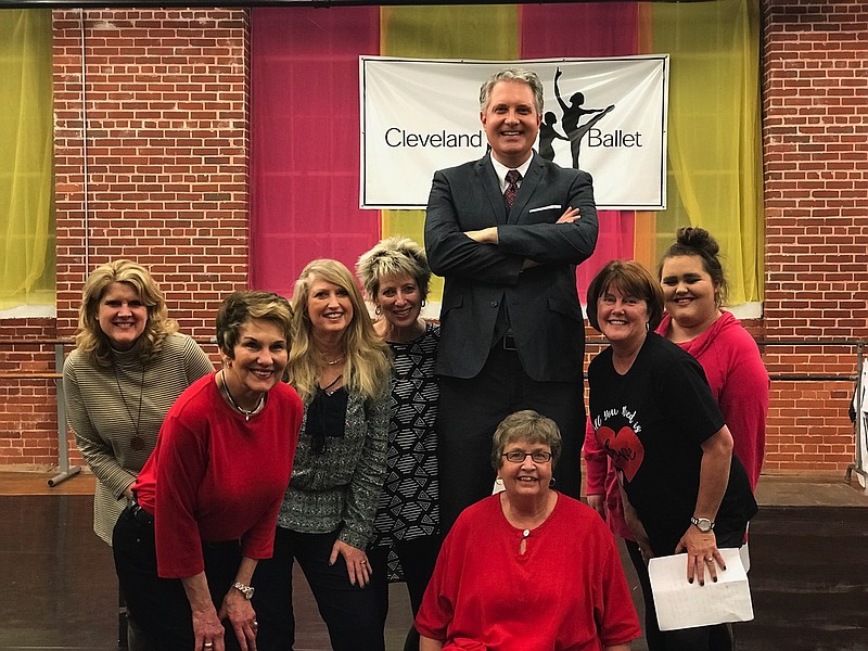 Greg Glover, standing, with cast members Tammy Ashton, Judy Robinson, Tammy Bentley, Kathy Karnes, Nancy Casson (seated), Lisa Geren and Danielle Calfee, from left.