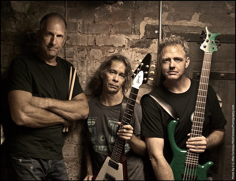 The Tim Reynolds Trio includes drummer Dan Martier, Reynolds and bass player Mick Vaughn, from left.