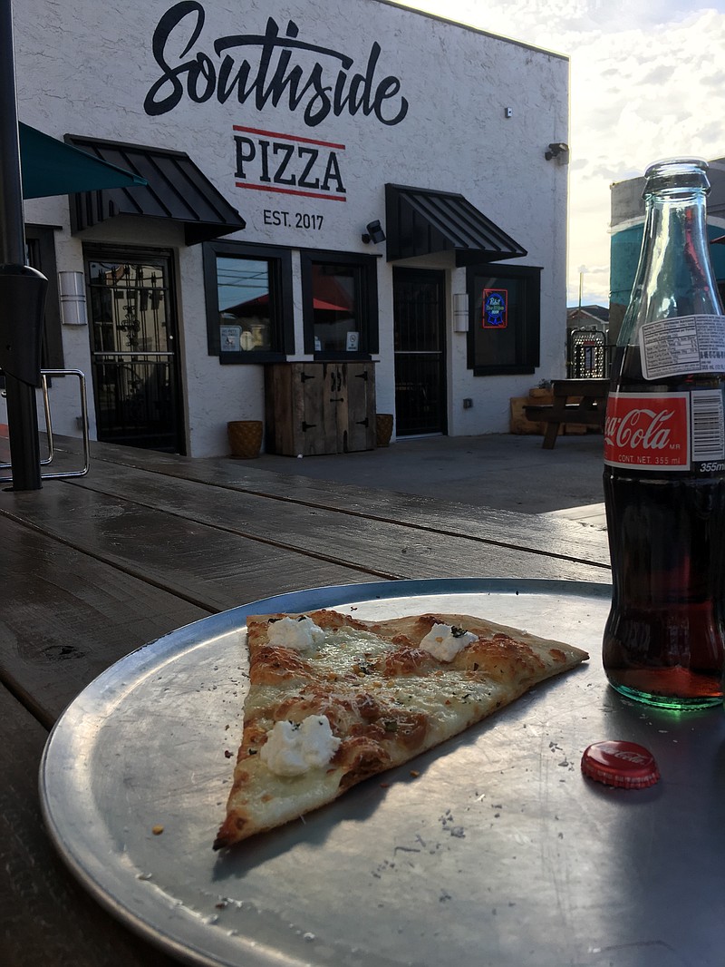 A slice of Bianco pizza and soft drink was about $6 at Southside Pizza. (Photo: Cameron Morgan)