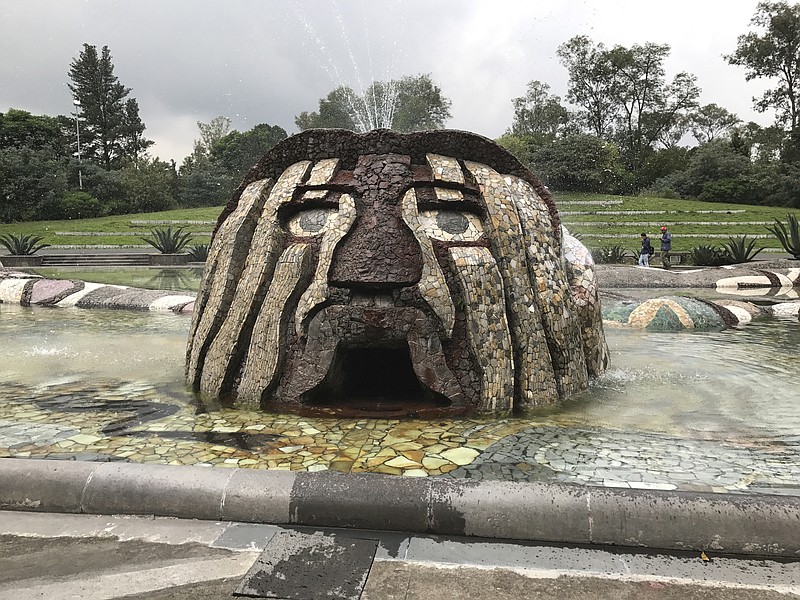 
              In this photo taken on Sept. 5, 2017, a fountain that Diego Rivera designed featuring the Aztec rain god Tlaloc, stands outside a hydraulic structure called the Carcamo de Dolores, or the Dolores Sump. The monument inside the Second Section of the Mexican capital's Chapultepec Park features a little-known Rivera mural painted to honor Mexico City's water system, called "Water, the Source of Life." (AP Photo/Anita Snow)
            