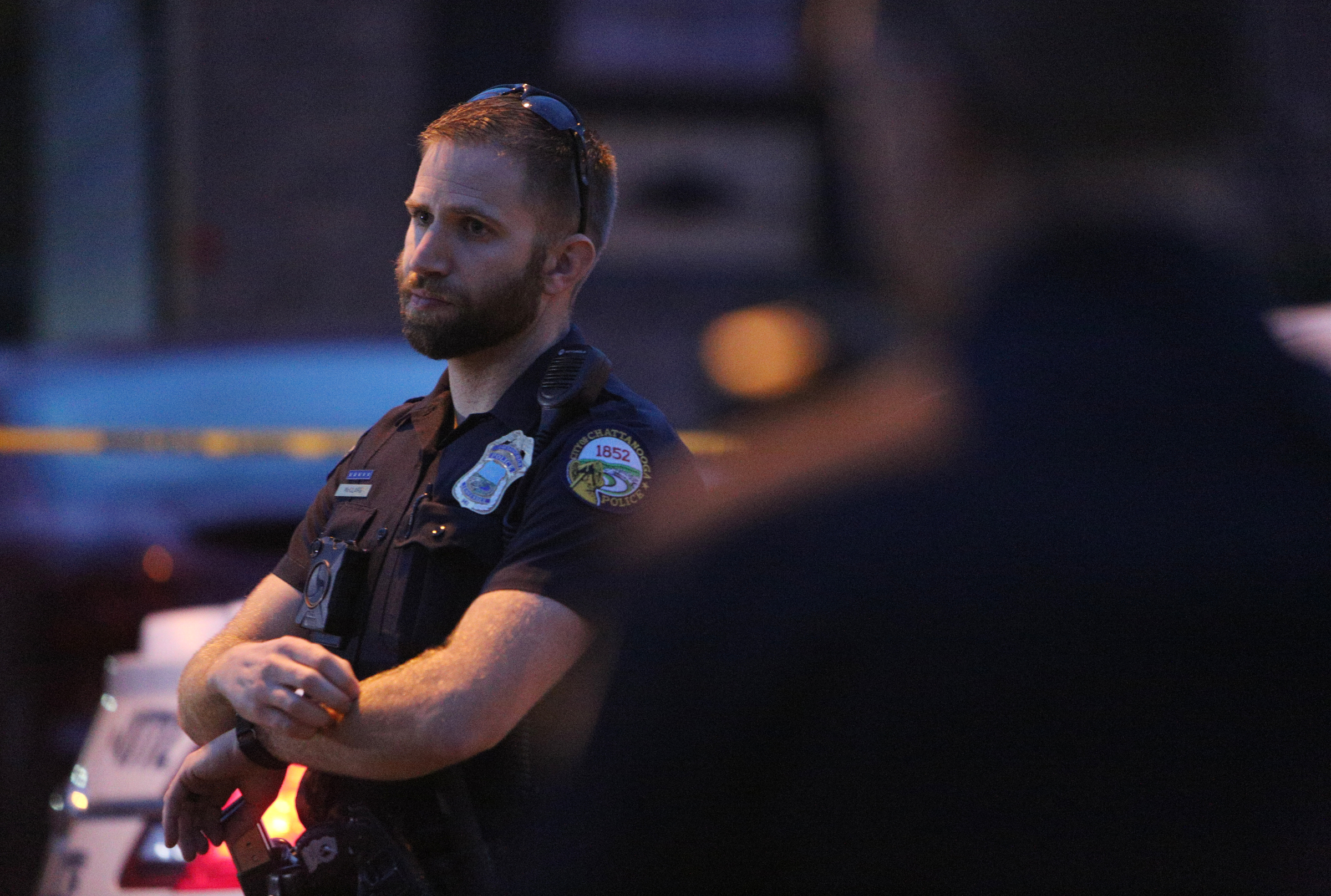 Chattanooga police officers work the scene of a shooting Tuesday, Feb. 20, 2018 in the 1400 block of Carousel Road in Chattanooga, Tenn. One person is deceased following the incident and another is in critical condition.