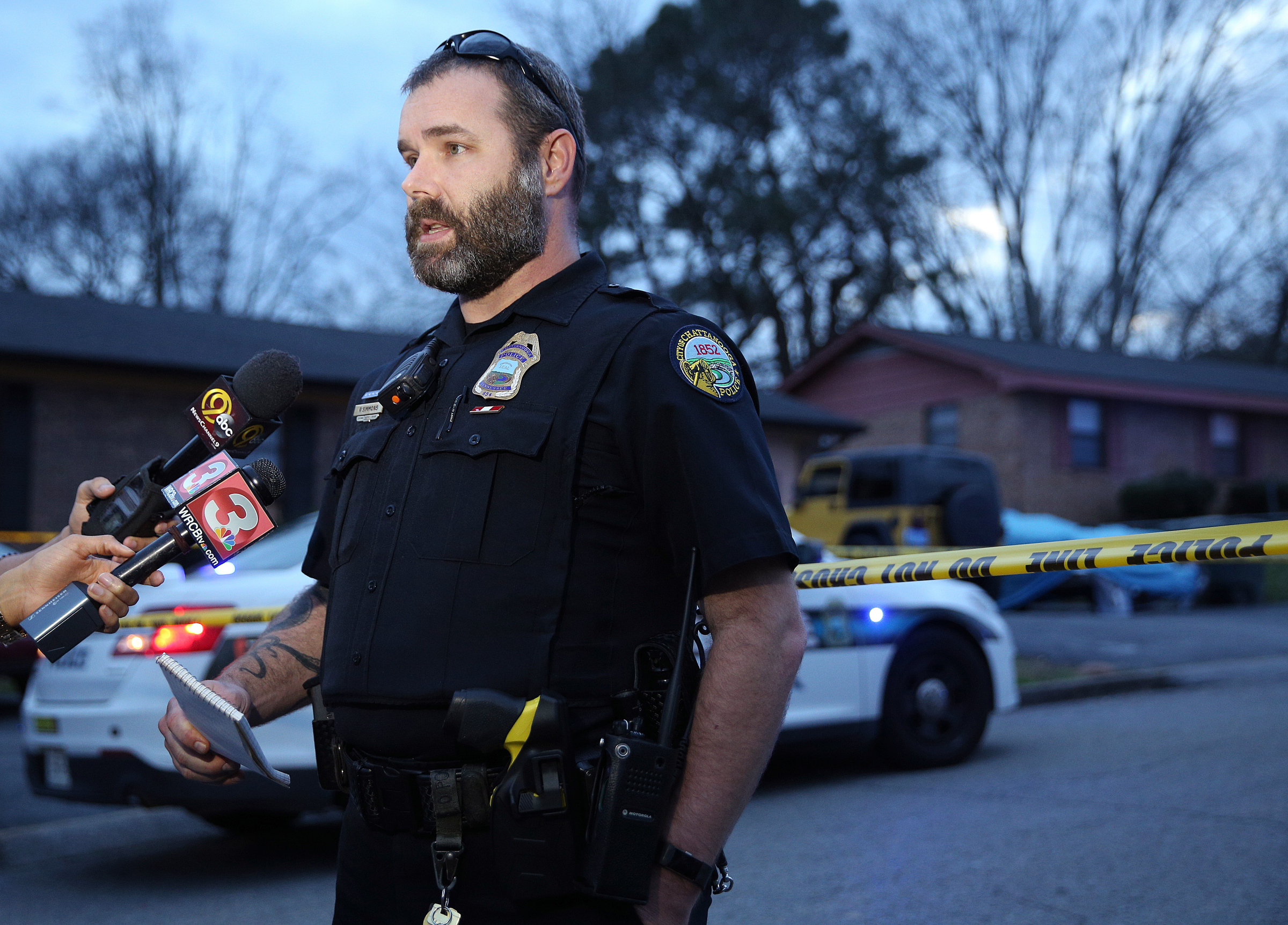 Chattanooga Police Department spokesperson Rob Simmons speaks during a press briefing at the scene of a shooting Tuesday, Feb. 20, 2018 in the 1400 block of Carousel Road in Chattanooga, Tenn. One person is deceased following the incident and another is in critical condition.