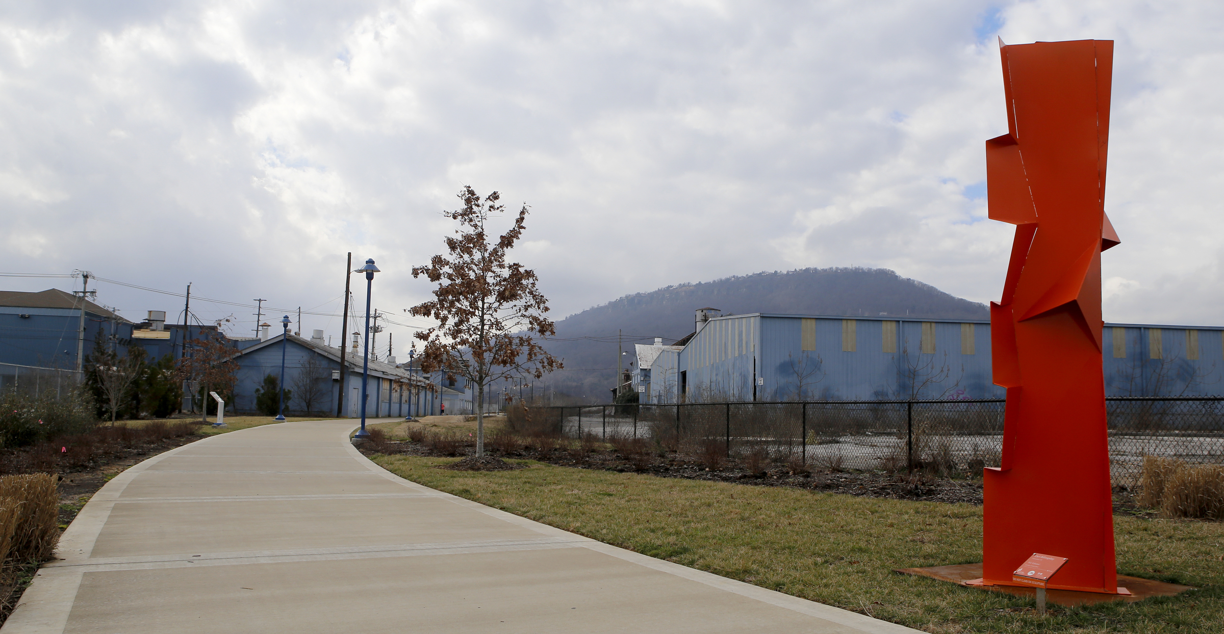 The Tennessee Riverwalk is seen looking south past part of the Wheland/U.S. Pipe site in the South Broad Street District on Tuesday, Feb. 20, 2018 in Chattanooga, Tenn.