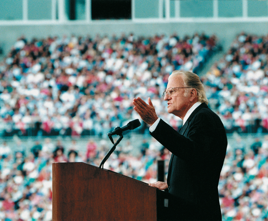 The Rev. Billy Graham preaches during a crusade.