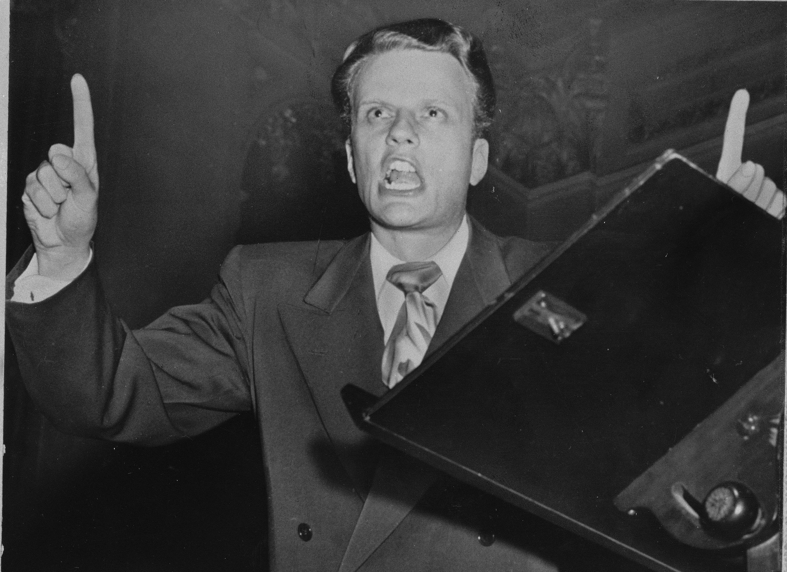 Evangelist Billy Graham is shown March 29, 1950 at Portland, Maine. (AP Photo)