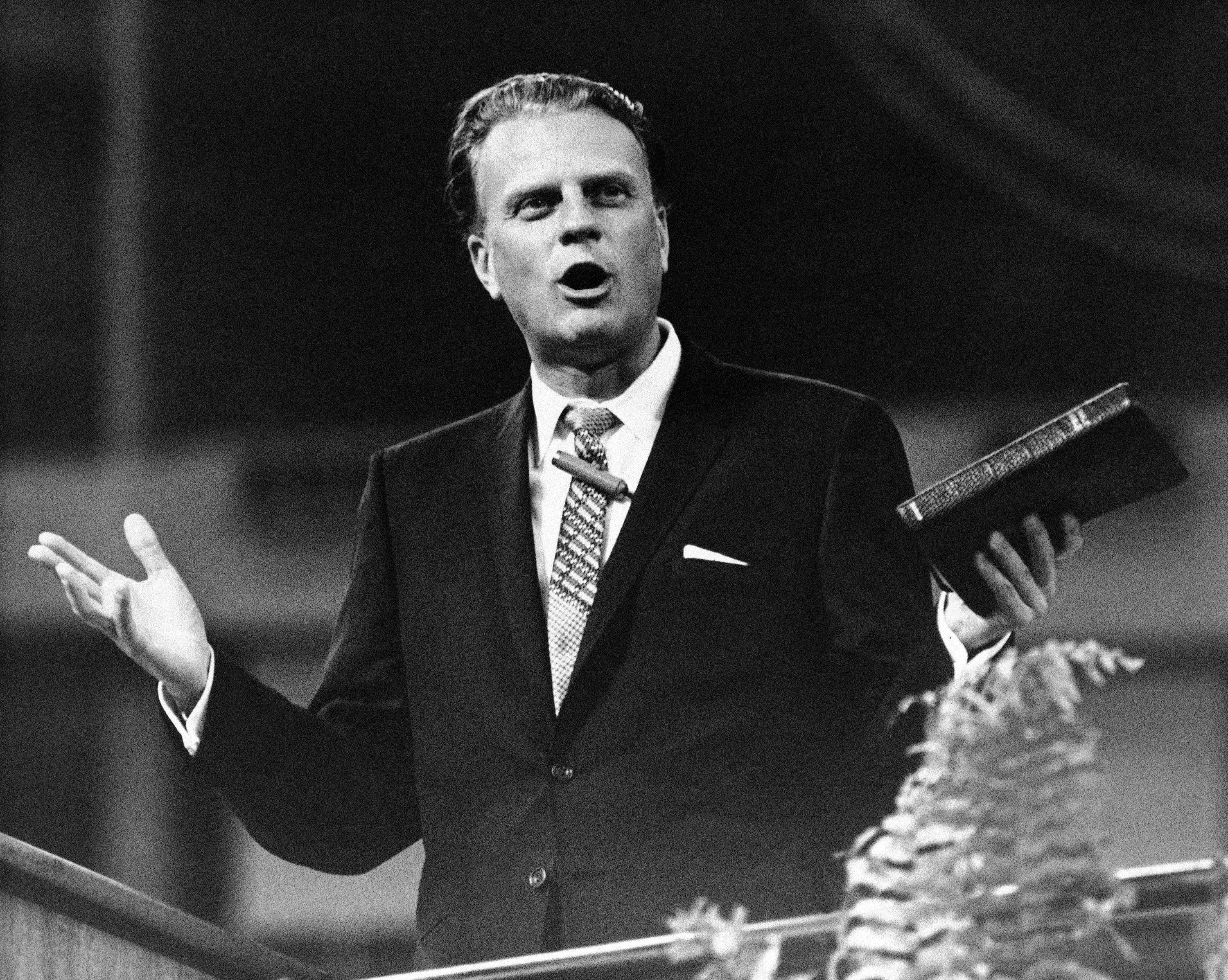 Dr. Billy Graham opens the Greater Houston Crusade in Harris County Dome Stadium in Houston, Texas on Nov. 20, 1965. (AP Photo/DCN)