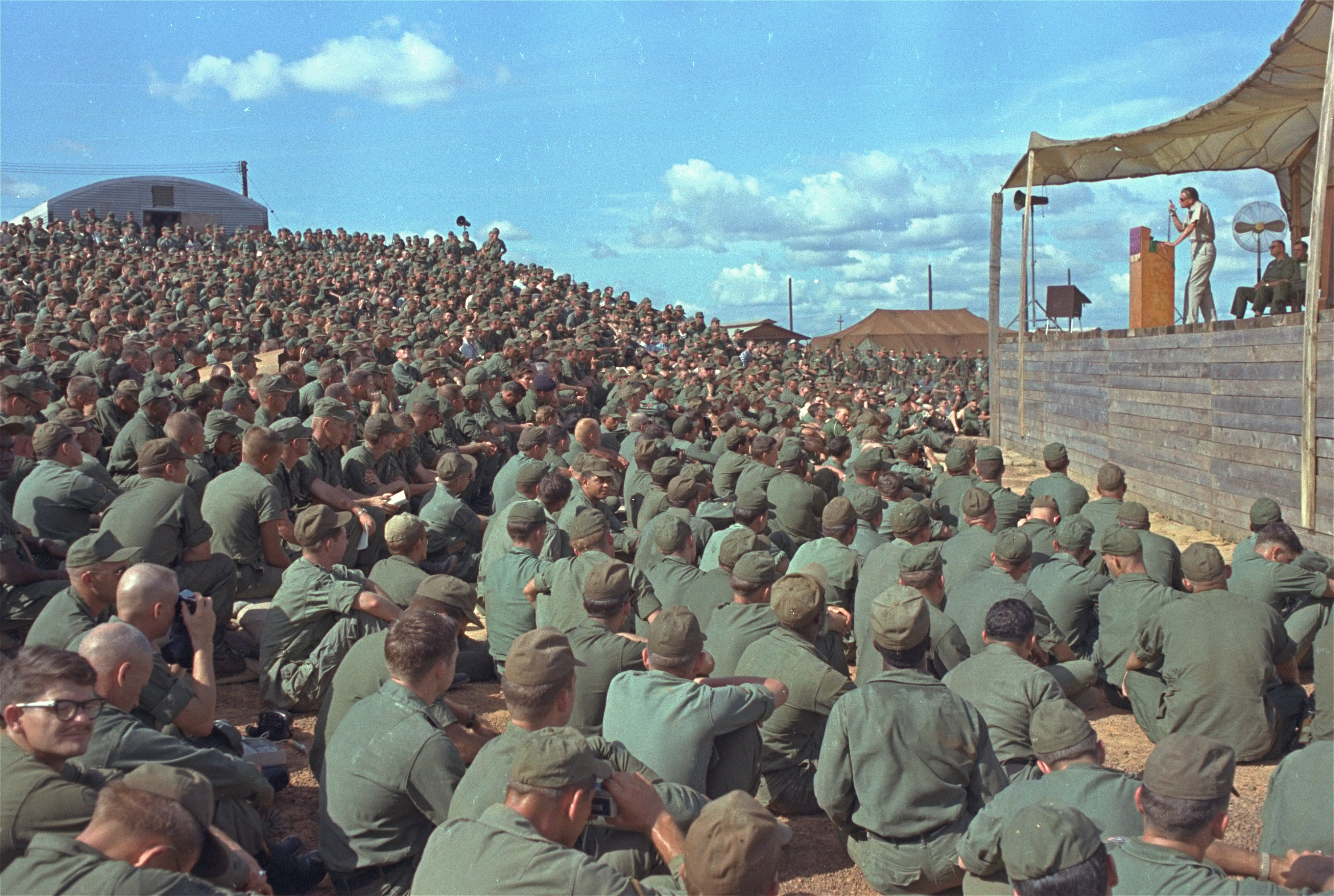 Evangelist Billy Graham speaks a crowd of more than 5,000 U.S. troops at Long Binh, Vietnam, December 23, 1966. (AP Photo)