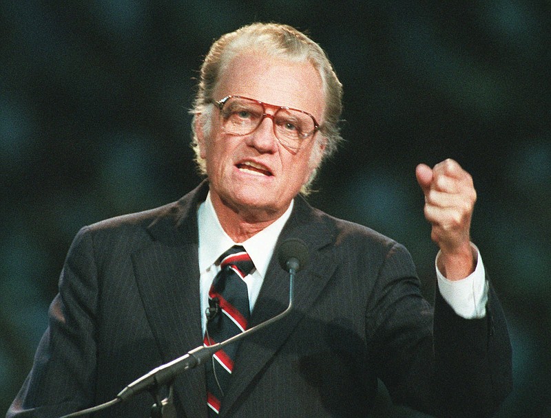 FILE - In this Oct 26, 1994 file photo, Evangelist Billy Graham begins his sermon in Atlanta's Georgia Dome.