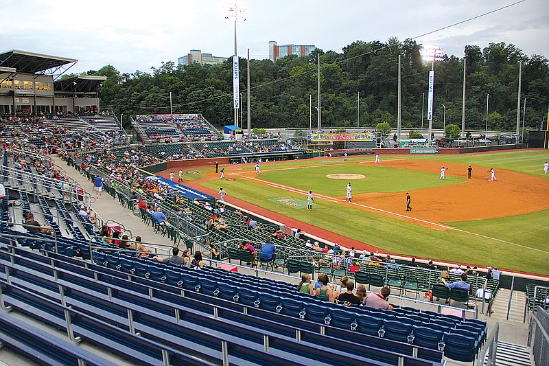 Fans watch the Chattanooga Lookouts game at AT&T Stadium in Chattanooga. Lookouts owners say they are ready to begin talks with officials about constructing a new stadium on the 141-acre site of the former U.S. Pipe/Wheland Foundry located in the South Broad District. / Staff file photo