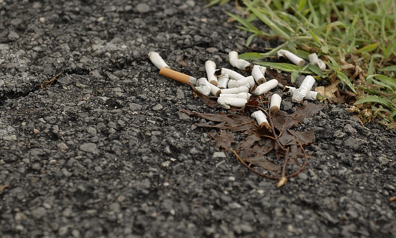 Littered cigarette butts on the ground in Highland Park can find their way into the sewer system and create problems.