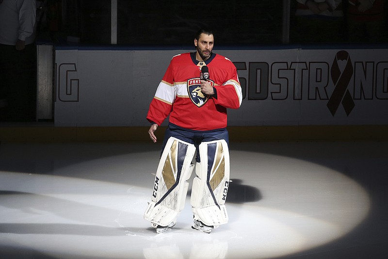
              Florida Panthers goaltender Roberto Luongo (1) talks to fans about the shooting at Marjory Stoneman Douglas High School, prior to an NHL hockey game against the Washington Capitals, Thursday, Feb. 22, 2018, in Sunrise, Fla. (AP Photo/Joel Auerbach)
            
