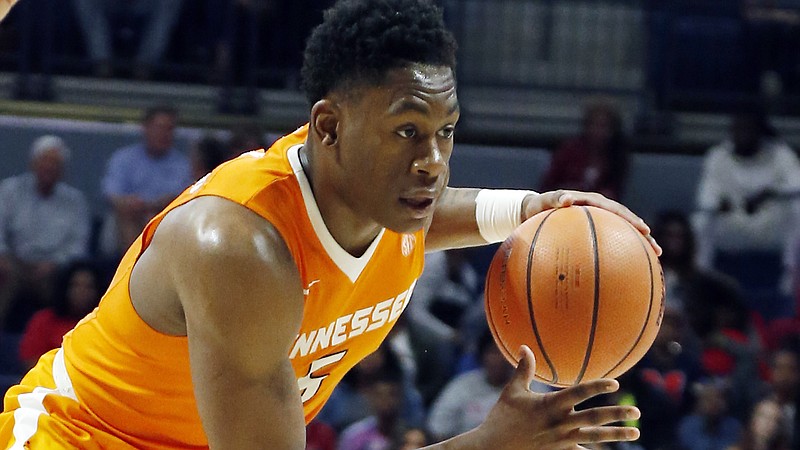 Tennessee forward Admiral Schofield (5) dribbles up court during the second half of an NCAA college basketball game against Mississippi in Oxford, Miss., Saturday, Feb. 24, 2018. Tennessee won 73-65. (AP Photo/Rogelio V. Solis)