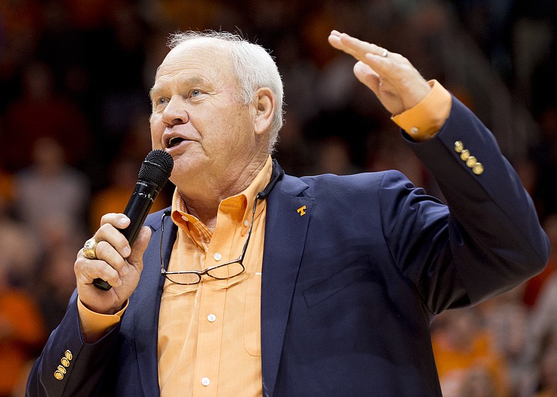 Tennessee Athletics Director and former Tennessee head football coach Phillip Fulmer introduces new Tennessee football coach Jeremy Pruitt in the first half of an NCAA college basketball game, Saturday, Dec. 9, 2017 in Knoxville, Tenn. (AP Photo/Calvin Mattheis)