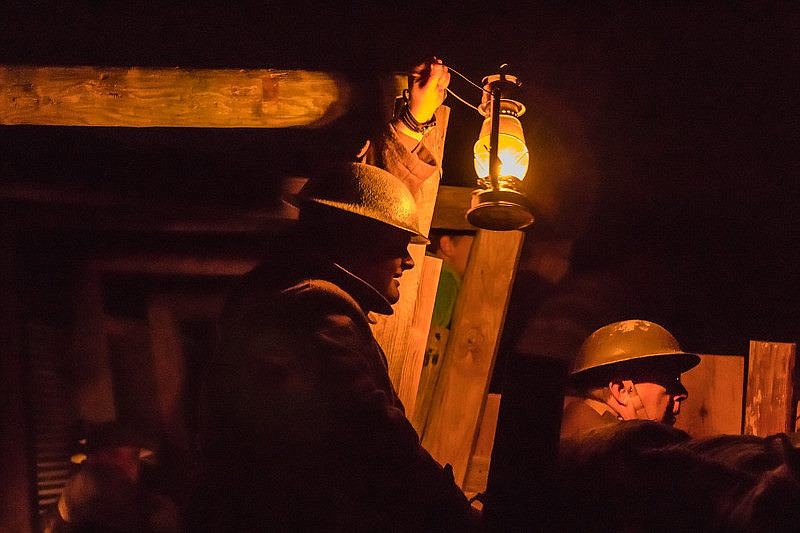 A group re-enacts a WWI battle from the trenches at Sgt. Alvin C. York State Historic Park. 