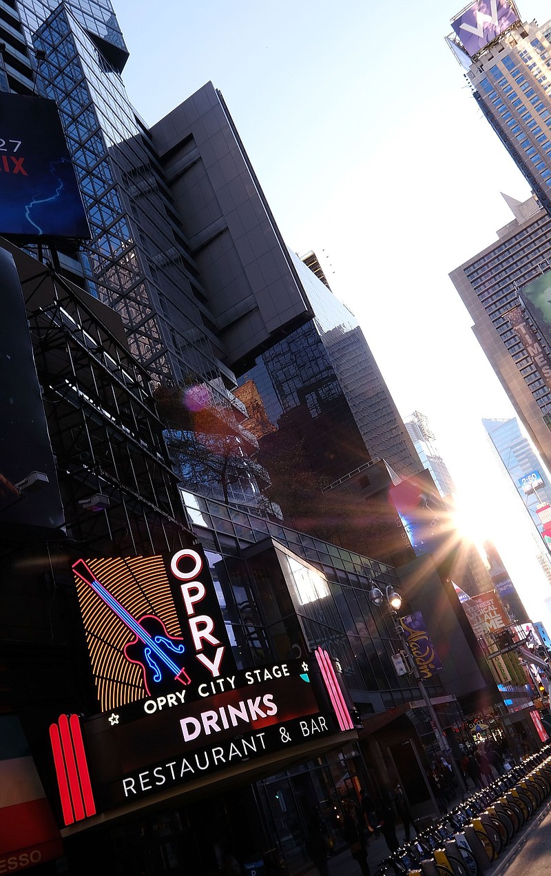 Opry City Stage in New York's Times Square gives tourists a taste of Music City in the Big Apple. The country bar is a $14 million project from Opry Entertainment, which owns Nashville's Grand Ole Opry.