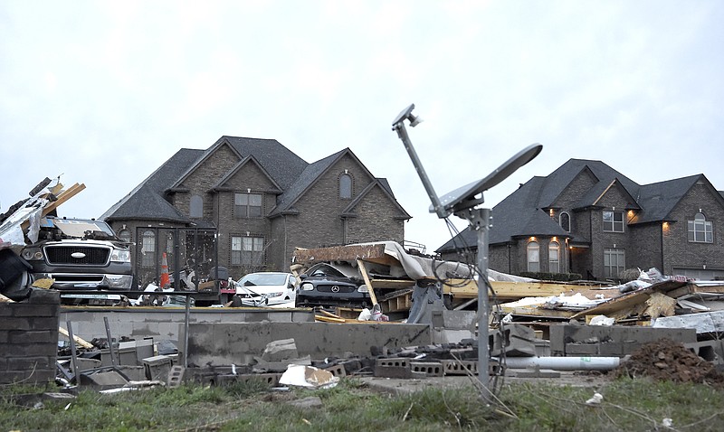 A home at the corner of Covey Rise Circle and Green Grove Way is reduced to rubble Sunday, Feb. 25, 2018, after a fierce storm came through the Farmington subdivision in Clarksville, Tenn. on Saturday night. (Lacy Atkins/The Tennessean via AP)