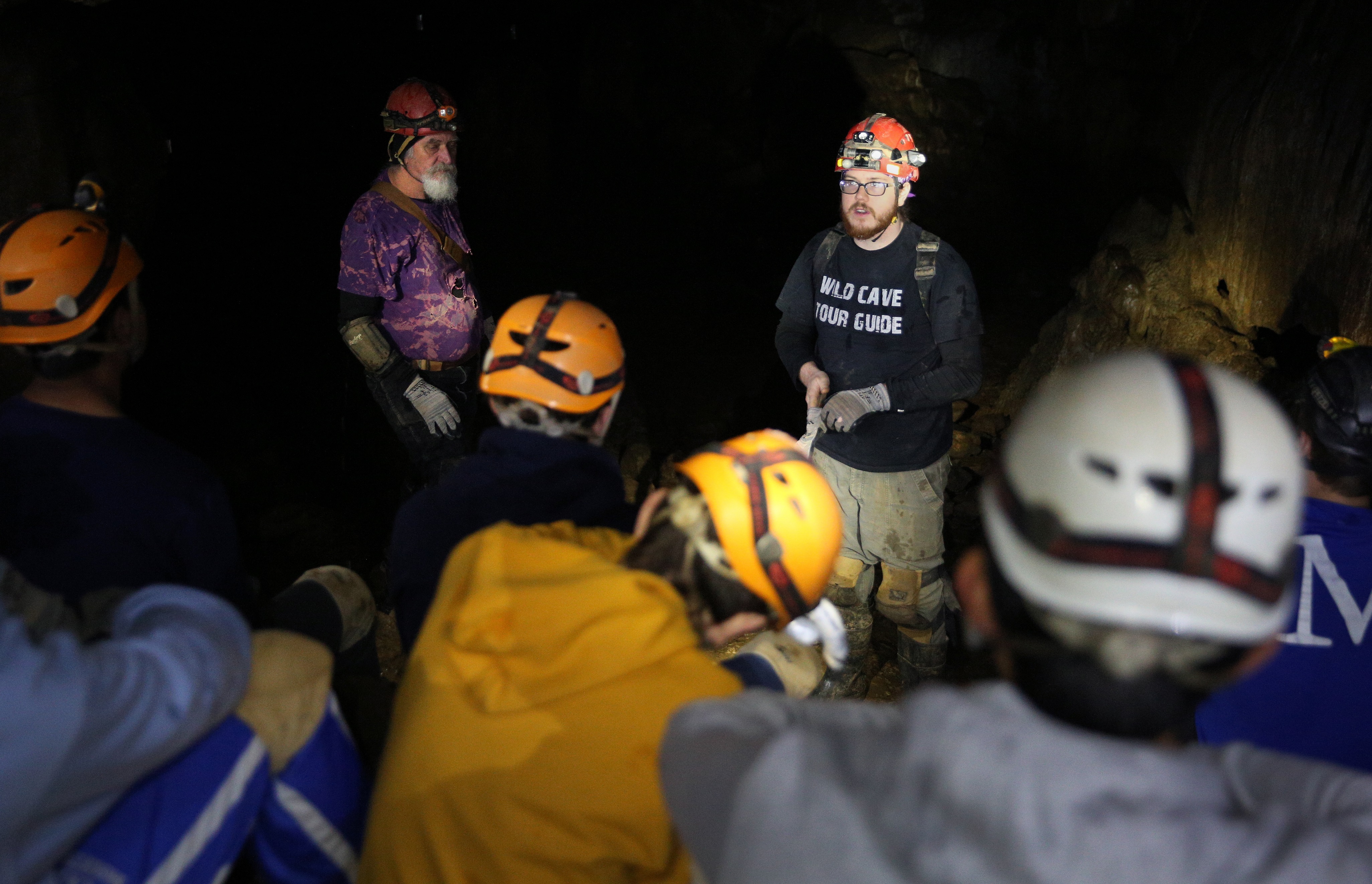 Throughout the tour, adventure guides Jerry Wallace, left, and Devin McGinty stop to talk about cave formations, wildlife or conservation.