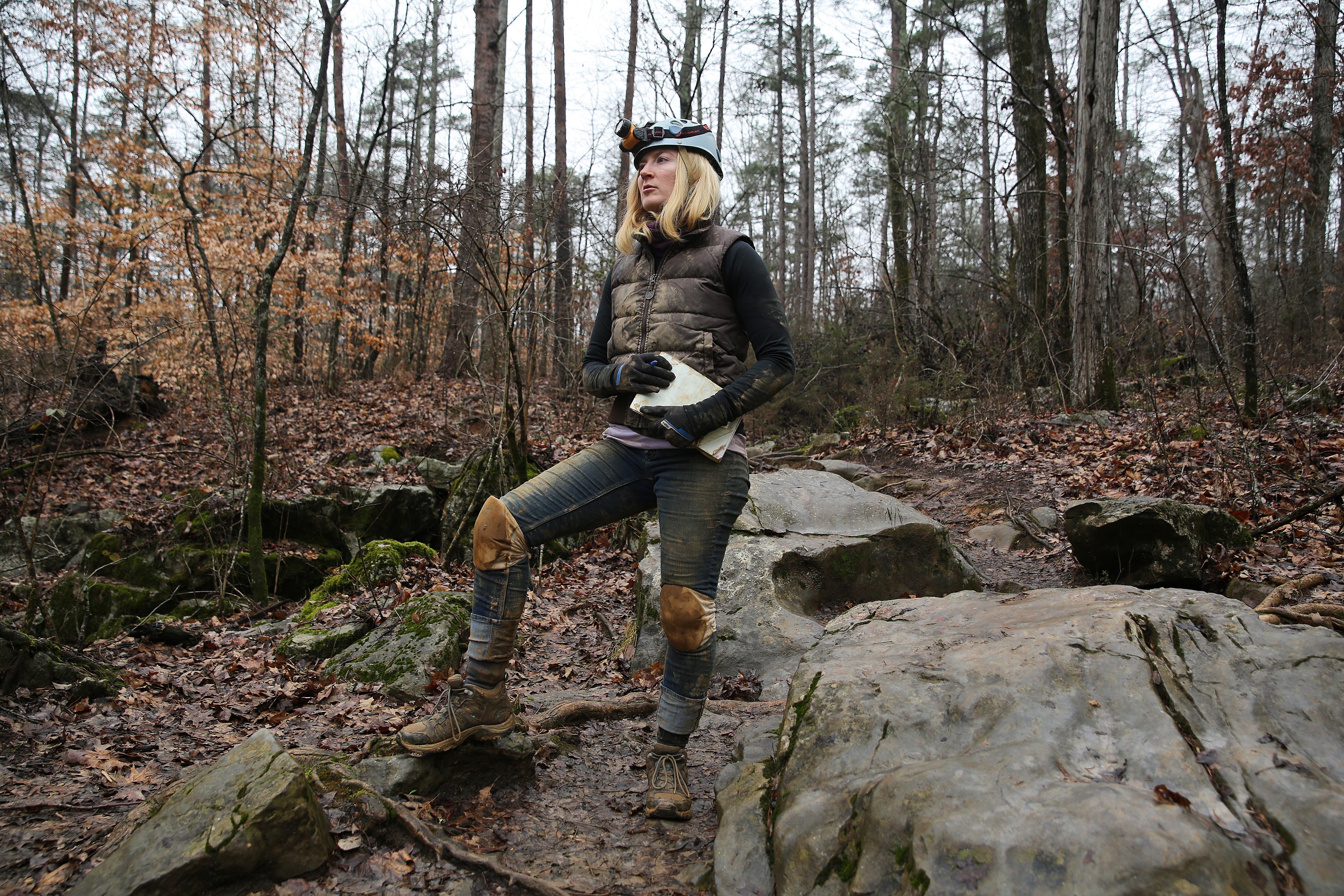 Covered in mud, Sunny Montgomery emerges from Pettyjohn's Cave following her two-hour tour.