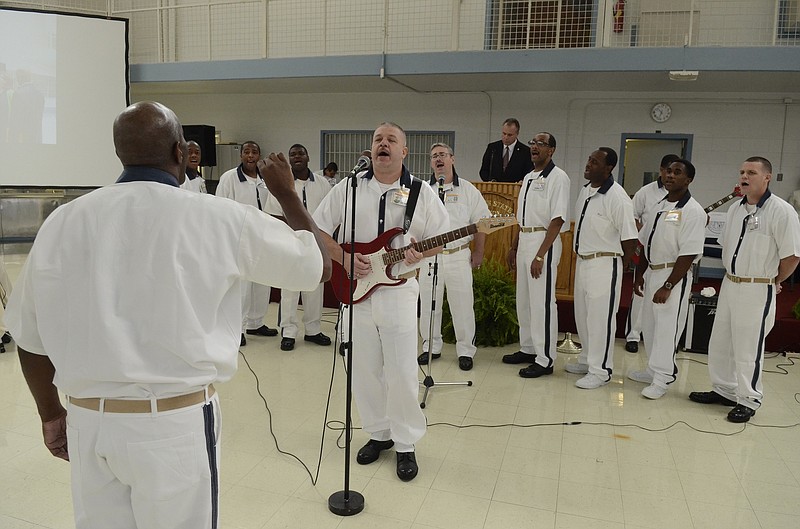 Staff file photo by John Rawlston/Chattanooga Times Free Press - Inmates in the Walker State Prison Choir rehearse at the Walker State Prison in Rock Spring in a Sept. 7, 2011 file photo. Later that morning, a commissioning ceremony was held denoting the prison as Georgia's first Faith and Character Based Program. An exhibit of works by Walker inmates will be featured at the Lafayette Welcome Center March 4.