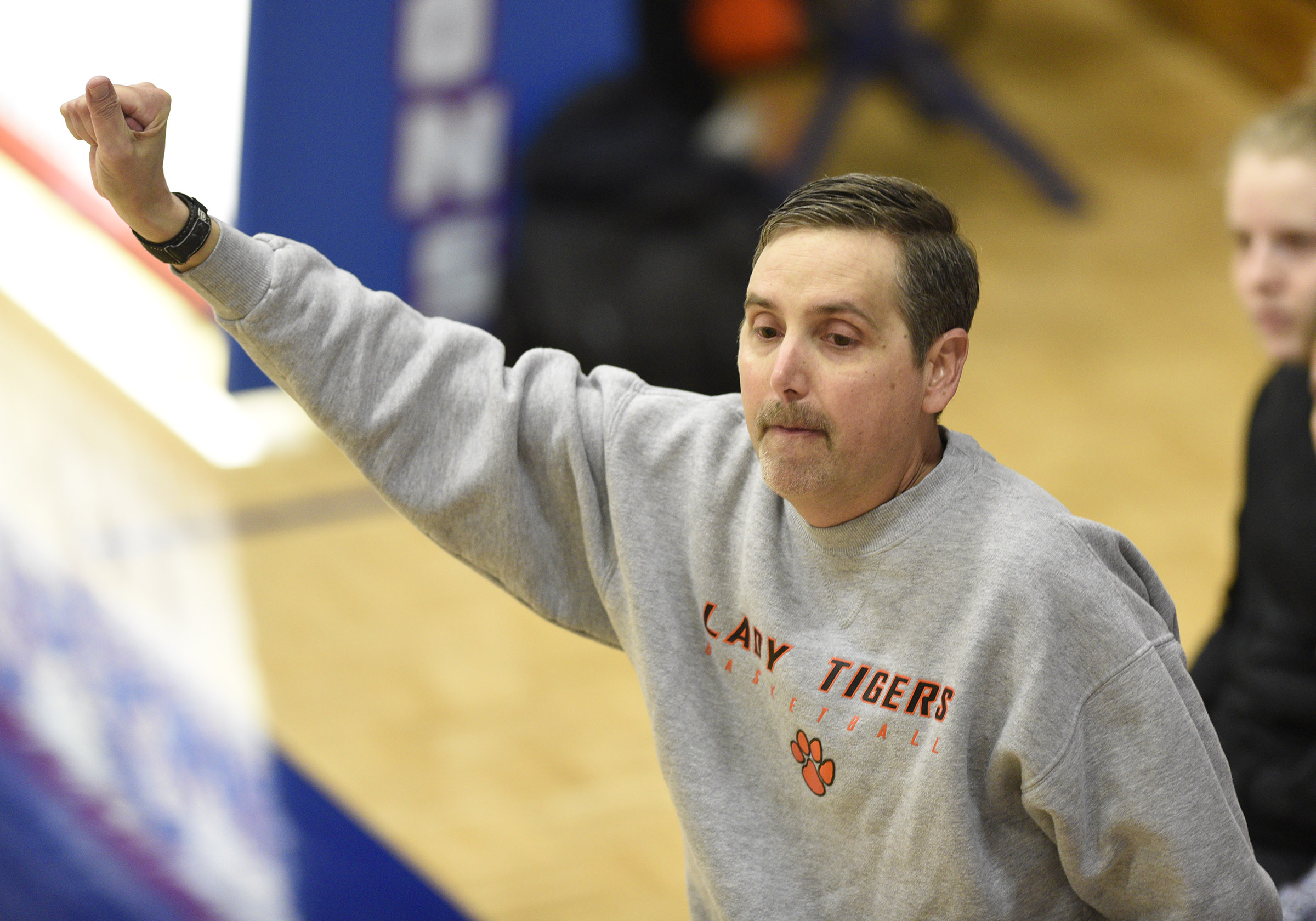 Meigs County head coach Jason Powell calls the play. The Meigs County Tigers played the Signal Mountain Eagles in the semi-final game of the girls's Region 3-AA TSSAA Tournament held at Red Bank High School on February 26, 2018.