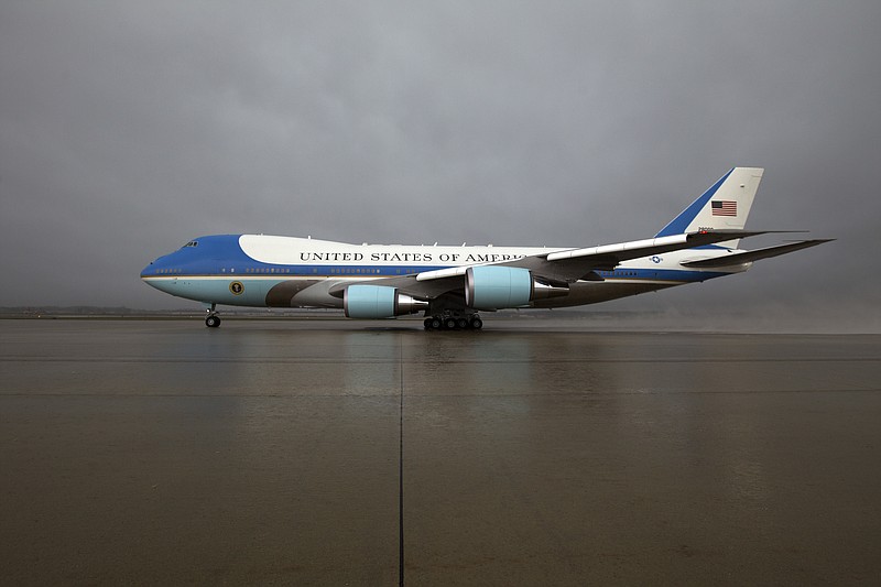 In this April 6, 2017 file photo, Air Force One, with President Donald Trump aboard, departs from Andrews Air Force Base, Md., en route to Mar-a-Largo, in Palm Beach, Fla., for a meeting with Chinese President Xi Jinping. Trump has reached an informal deal with Boeing to provide the next generation presidential aircraft. Deputy press secretary Hogan Gidley says the $3.9 billion "fixed price contract" for the new planes, known as Air Force One when the president is on board, "will save the taxpayers more than $1.4 billion." ( AP Photo/Jose Luis Magana)