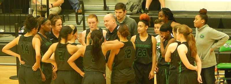 East Hamilton girls' basketball coach Hunter Gremore relays a message to his players during a timeout Monday at Rhea County in a Region 3-AAA semifinal. The Lady Hurricanes defeated Stone Memorial 67-62 and will play Bradley Central in Wednesday's final.