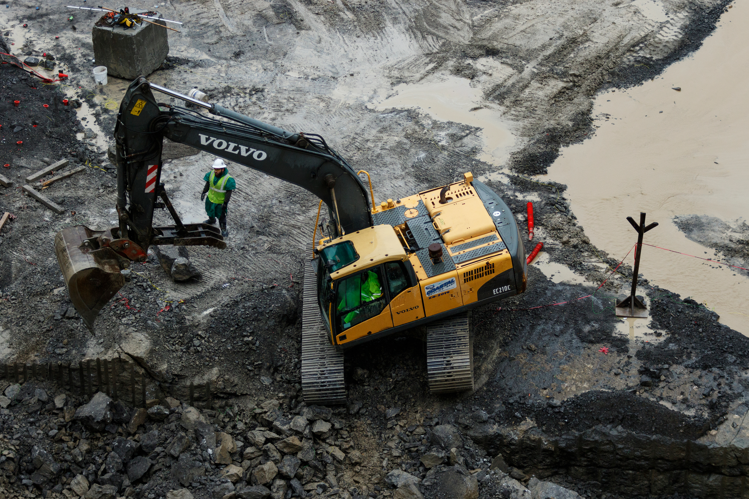 An excavator operates in the Chickamauga Dam Lock on Wednesday, Feb. 28, 2018, in Chattanooga, Tenn. The Inland Waterways Users Council took a tour of the lock.