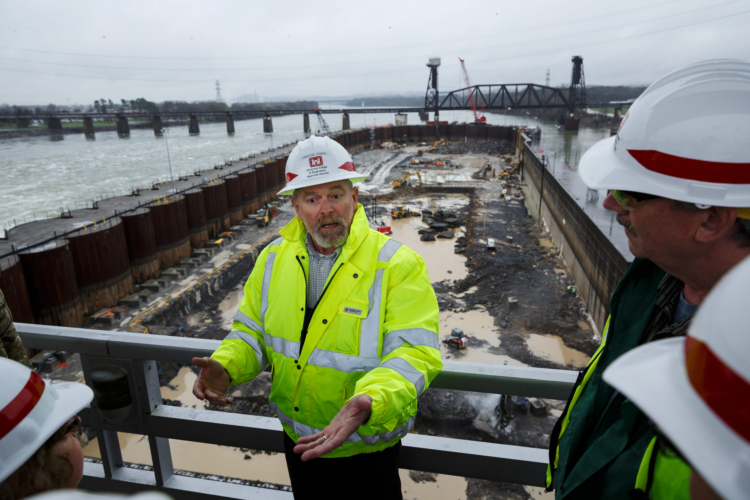 Dewayne Ponds talks about construction in the Chickamauga Dam Lock on Wednesday, Feb. 28, 2018, in Chattanooga, Tenn. The Inland Waterways Users Council took a tour of the lock.